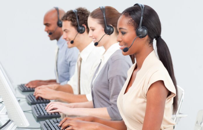 Concentrated business team working in a call center